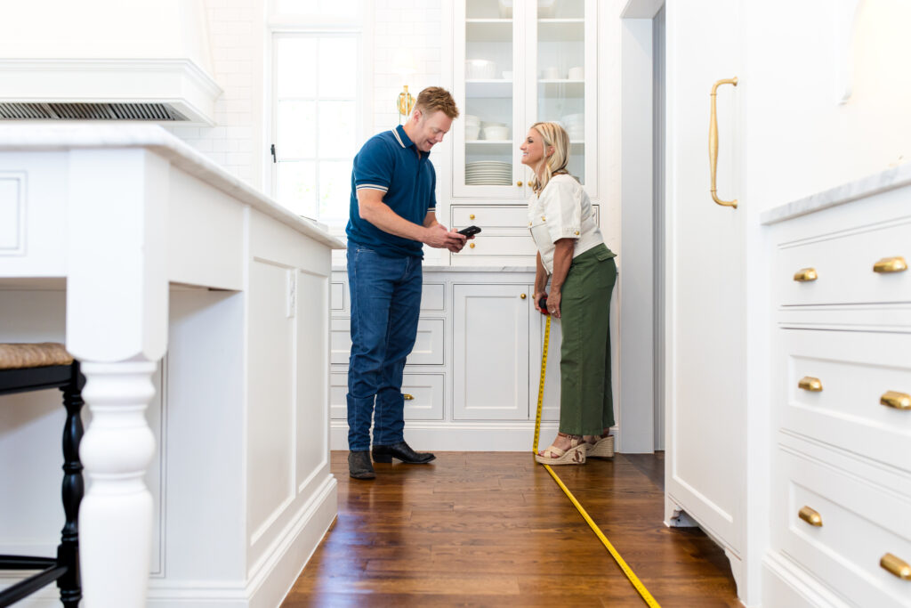 On-site measurement day in a Dallas kitchen remodel—verifying layout for cabinetry, appliances, and a smooth build.